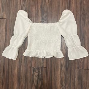 White puff sleeve top